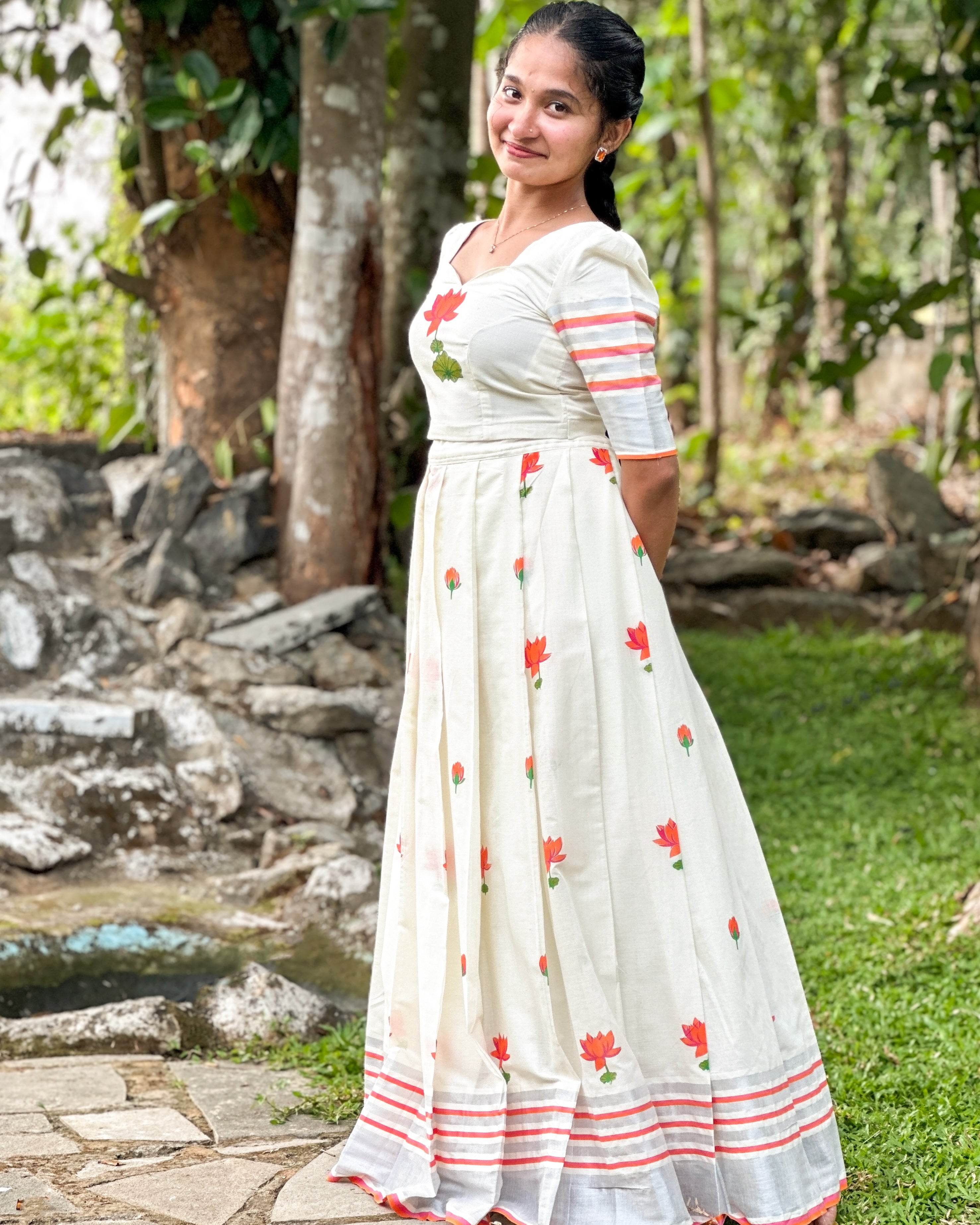 Lotus Printed Top & Skirt Set – Orange with Silver Kasavu Border